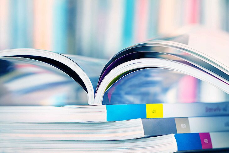 Close up stacking of magazines.